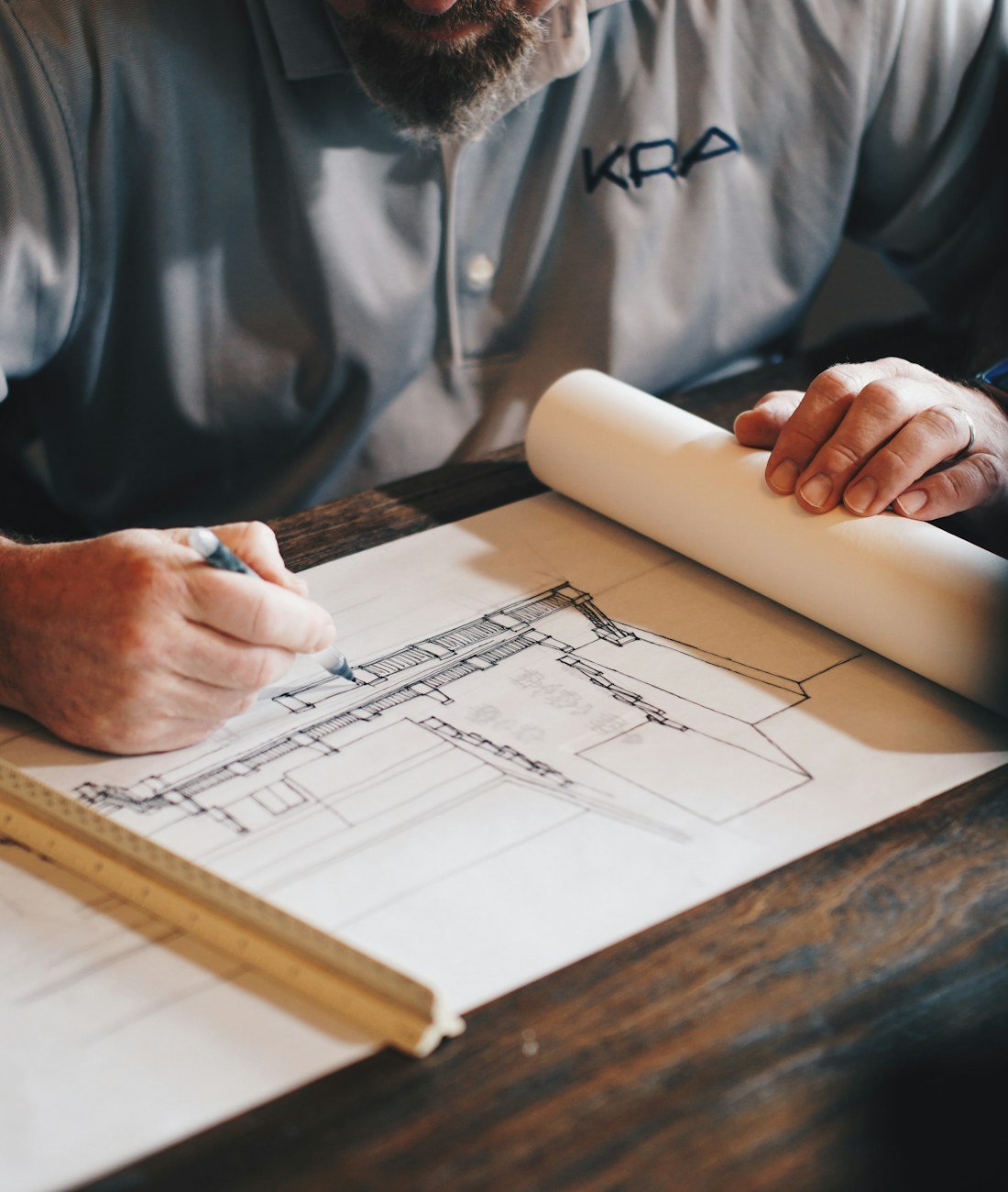 Ottawa builder reviewing architectural drawings for a residential renovation