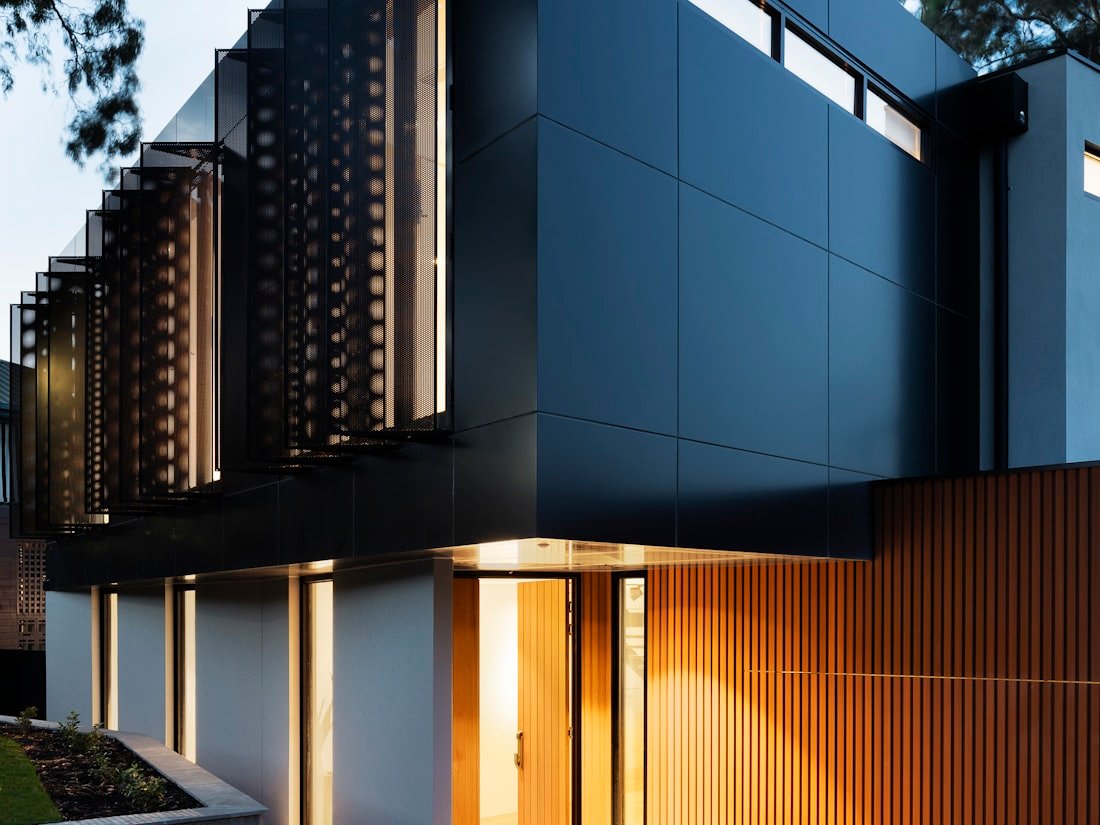 Whole-home Ottawa renovation with dark cladding and contemporary modern envelope